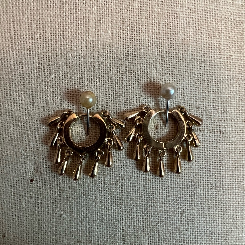 Sold out Rebecca Minkoff teardrop huggie earrings.